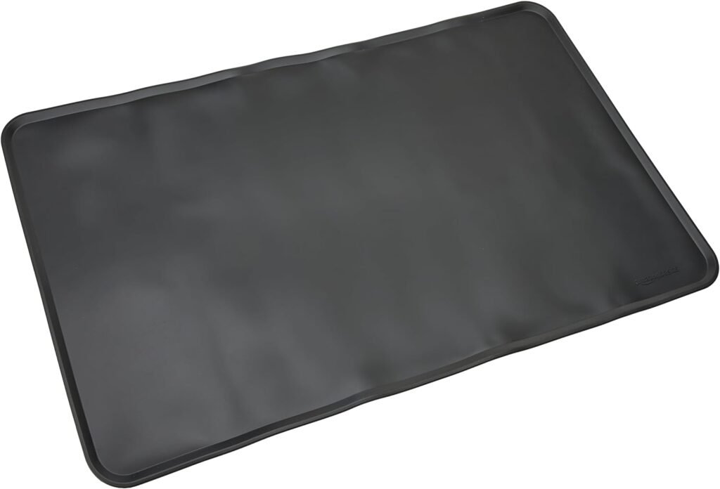 05 Amazon Basics Waterproof Anti-Slip Silicone Pet Food and Water Bowl Mat, 24 x 16 Inches, Black, Solid